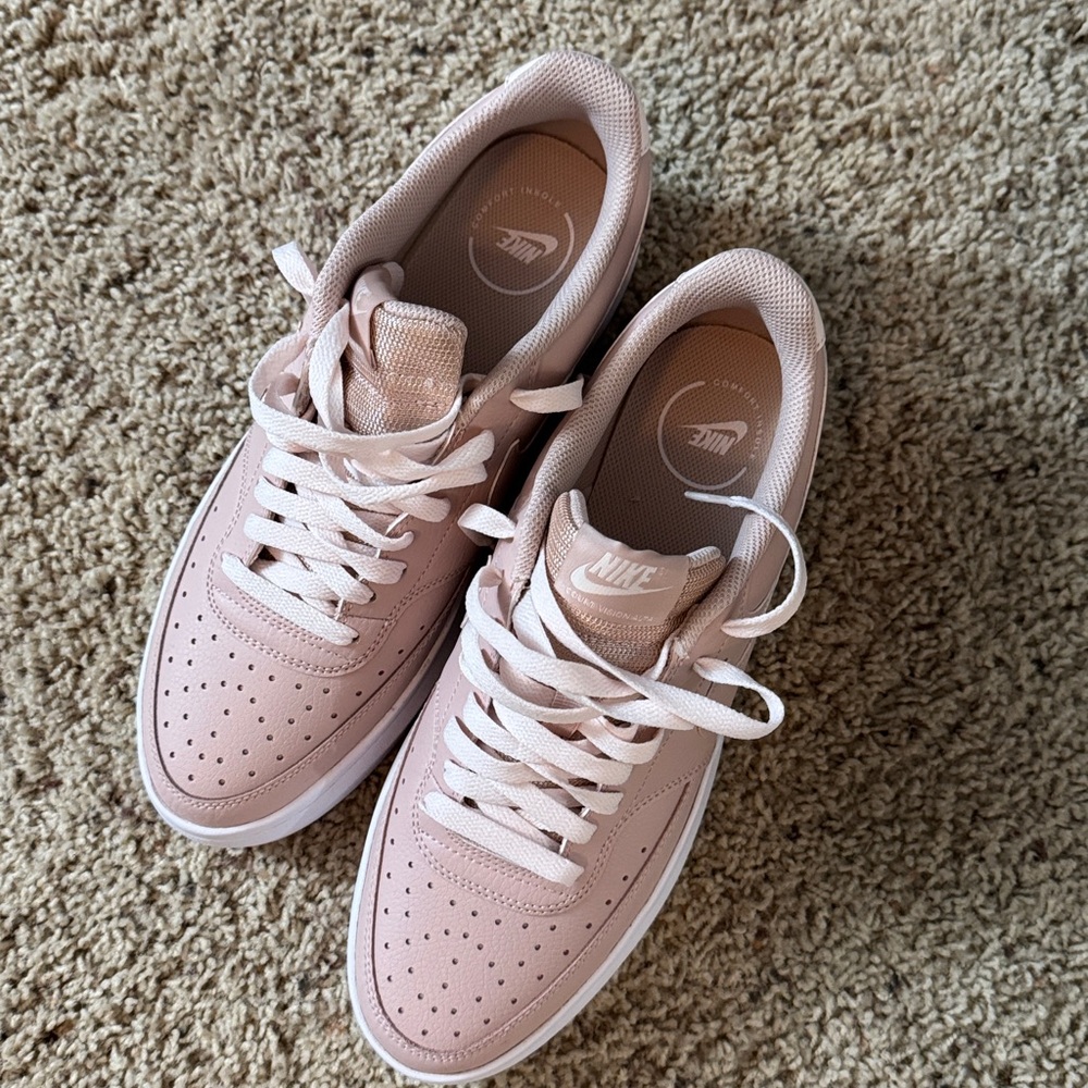 Nike size 11 woman’s shoes. Pink